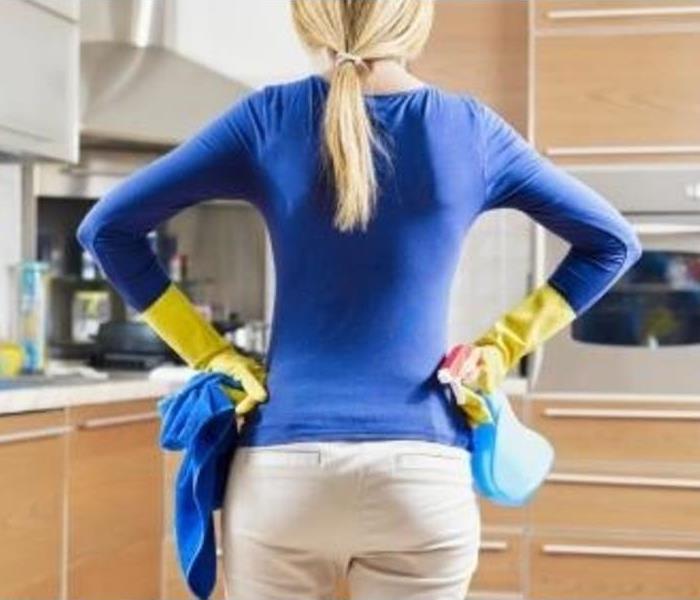 woman preparing to clean 